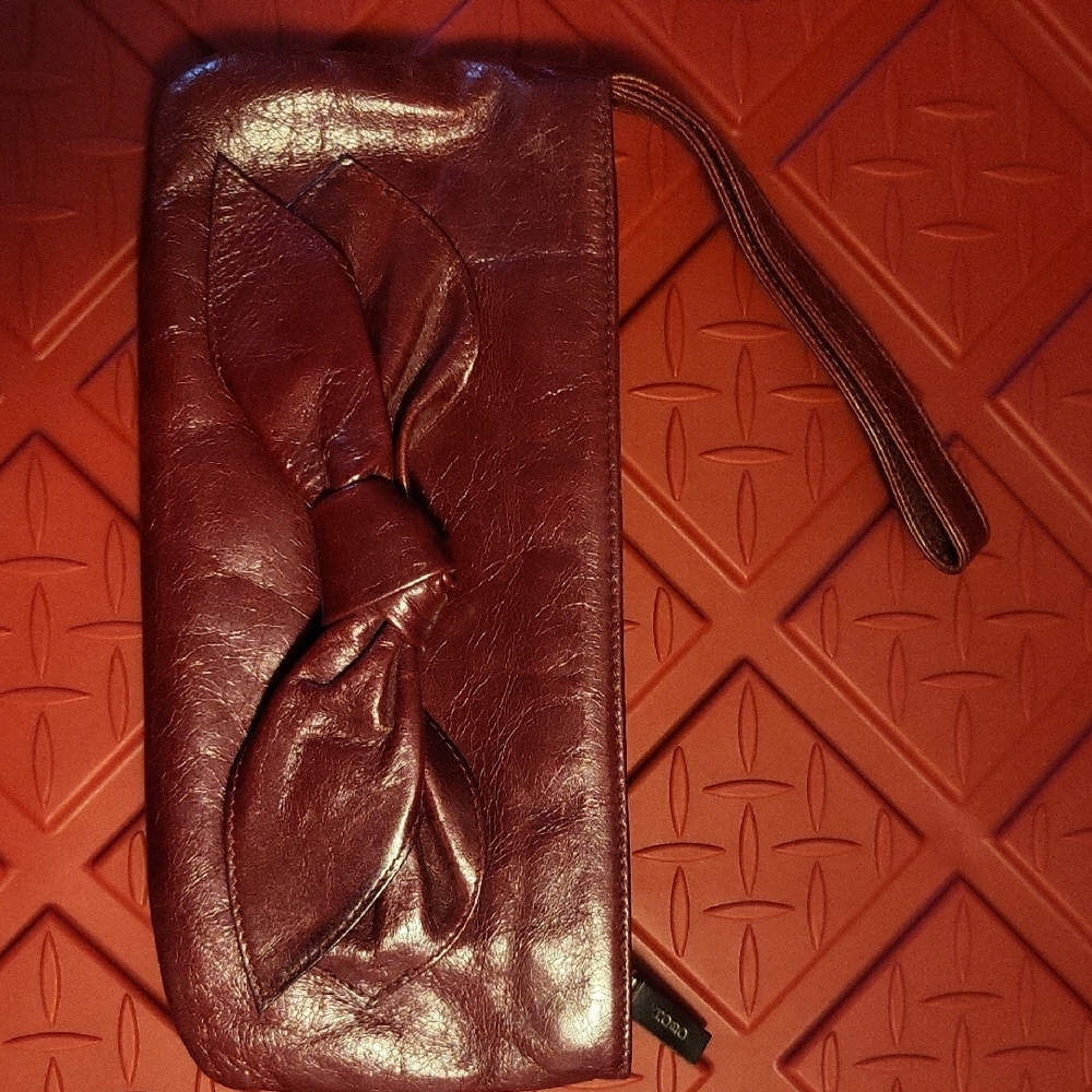 HOBO Rich Red Leather Clutch with Bow Accent